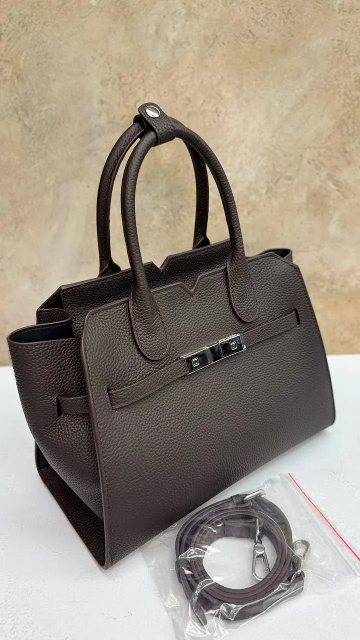 AURORA STRUCTURE” — the leather power bag for everyday icons