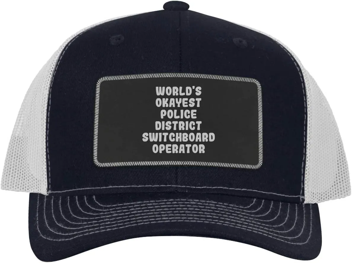 World's Okayest Police District Switchboard Operator - Leather Black Patch Engraved Trucker Hat